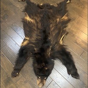 Brown/black bear rug.
